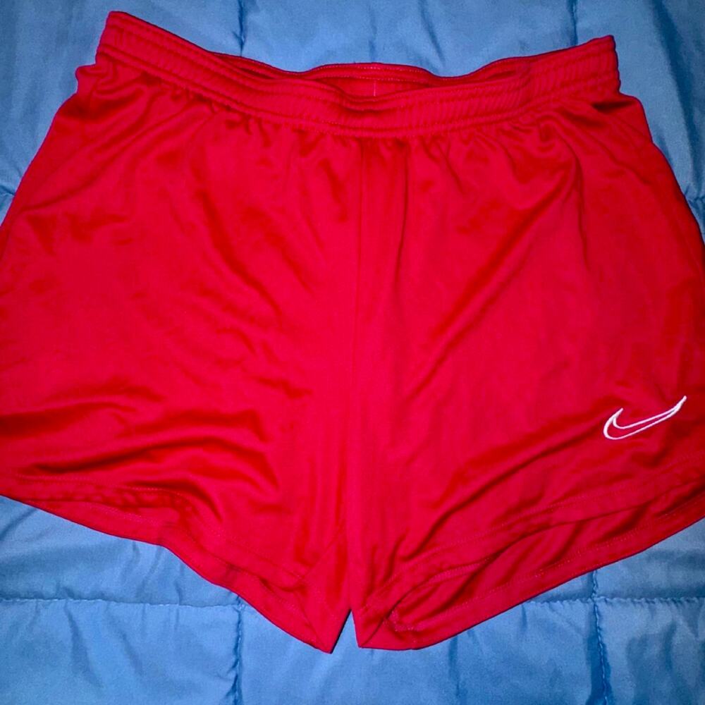 Nike red shorts size l